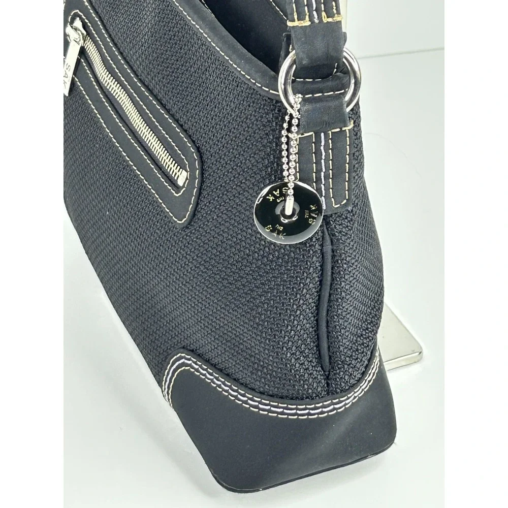 The SAK Black Waffle Structured Purse Medium Single Strap Pockets‎